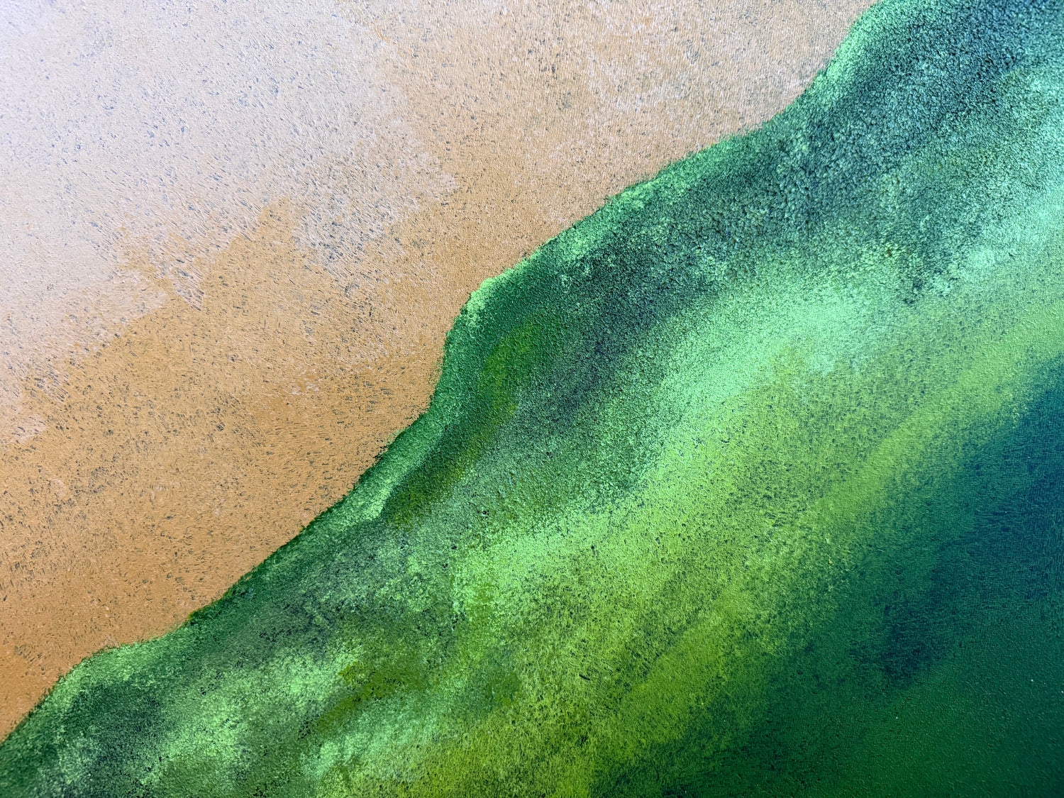 Gradient of green and blue on a textured surface