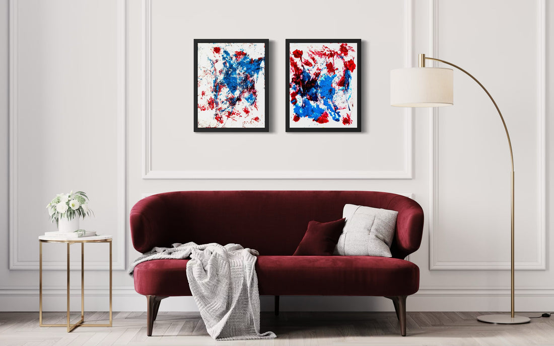 Limited-edition abstract canvas artworks displayed in a modern living room interior above a burgundy sofa, showcasing instinctive contemporary art by the French bulldog of Michel L’Artiste.