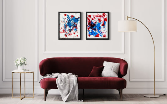 Limited-edition abstract canvas artworks displayed in a modern living room interior above a burgundy sofa, showcasing instinctive contemporary art by the French bulldog of Michel L’Artiste.