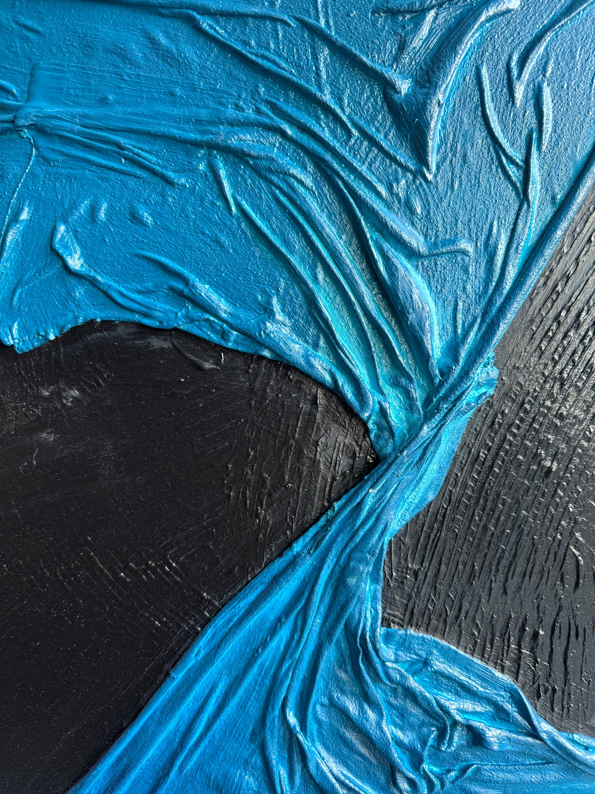 Close-up of textured blue and black surface